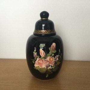 Hand painted black lidded jar decorated with flowers signed made in Portugal